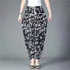 Nuevo Estilo Verano Pantalones de Seda de Hielo con Puño Elástico y Flores Pantalones Acampanados Elásticos para Mamá Pantalones de Verano Florales para Mujeres de Mediana Edad