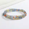 Joias europeias e americanas moda simples feitas à mão com contas de vidro miçangas de arroz corrente para o corpo cor versátil corrente de cintura elástica garota popular
