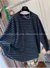 Camiseta Suelta de Manga Larga con Rayas Negras Contrastantes Relajada de Principios de Otoño para Mujer en Primavera y Otoño Nuevo Estilo Tops Perezosos y Populares