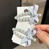 Clip de pato de perla azul claro dulce y etéreo con lazo, pasador de horquilla con diamantes de imitación, clip para flequillo, clip lateral, accesorio para el cabello