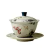 Porcelana Azul e Branca das Dinastias Tang e Song com Design de Orquídea Borboleta Pintada em Ouro Vermelho, Conjunto de Chá Cerâmico de Três Peças com Tigela com Tampa para Uso Doméstico