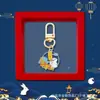 Chaveiro de Metal Coelho de Jade Estilo Chinês Festival do Meio Outono, Pingente de Fone de Ouvido Coelho Chang'e e Lua, Caixa de Presente Souvenir