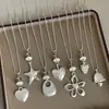Estilo Minimalista Colgante de Corazón y Estrella Mate Collar Largo, Único y de Nicho, Apilable, Cadena para Suéter Fresca y Versátil