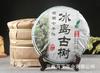 Té Pu'er al por mayor té crudo guiyuanchang Islandia árbol antiguo 357g pastel de siete semillas de Yunnan Té Té