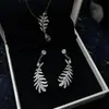 Nuevo Moderno Elegante Collar Pendiente Cadena Forma de O Hoja Pedrería Aretes Diseño de Nicho Incrustado con Diamante Cadena para Clavícula Colgante