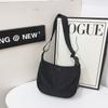 Nova bolsa feminina de tecido Oxford estilo western bolsa mensageira macia para compras estilo coreano design de nicho moderno bolsa de ombro feminina
