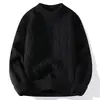 Suéter de cuello redondo para hombre Otoño e Invierno Color liso Suéter holgado Suéter trenzado casual para interior Top de estilo maduro ligero