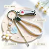 Llavero Colgante de Flor de Cerezo Dulce, Accesorio para Bolso de Niña, Llavero, Cortauñas de Dibujos Animados Tejido, Set Combinado de Limpiador de Oídos