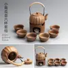 Cerámica Leña Vigas Elevadoras Hogar Cerámica Gruesa Tetera Retro Japonés Estufa Cálida para Té Cuerda Anti-Quemaduras Juego de Té Kung Fu