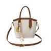 2025 Primavera Nuevo Dulce Casual Textura Trendy Bolso Cubo de Mano Moda Versión Coreana Un Solo Hombro Cruzado Moda Bolso de Mujer