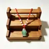 Collar colgante de jade de fábrica, pequeño lote mixto, collar colgante de jade, este año, venta caliente, collar colgante de jade de cuerda roja