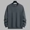 Nueva colección de otoño: Sudadera de color liso, cuello redondo, moderna y sin capucha para hombre, con corte holgado y casual y diseño versátil, perfecta como prenda básica para superponer.