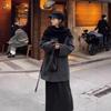 Estilo coreano con un conjunto de abrigo de lana gris acolchado de invierno con cuello en V y falda estilo sal y pimienta traje de dos piezas ligeramente cocido