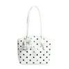 Bolso cubeta de lunares con lazo, estilo dulce y femenino para mujer, nuevo de moda versátil para el verano 2026, bandolera