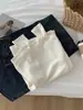 Elegante top slim fit estilo coreano com gola alta pequena, elástico e versátil, efeito emagrecedor, design de ombro raglã, cor sólida, camiseta de manga longa, peça básica para outono e inverno