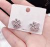 Nuevos ins de estilo coreano de alta gama Estilo cool Flor de lirio Plata s925 Aretes de botón para mujer Combinan con todo Aretes sencillos Aretes