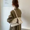Bolso de hombro ligero y lujoso de estilo retro para mujer, con gran capacidad, un nuevo diseño 2026, un aspecto sofisticado y un estilo versátil adecuado para el uso diario