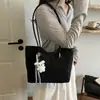 Bolso de mano vintage para mujer, nuevo modelo 2026, bolso de hombro versátil de nicho de alta gama, bolsa de mano tipo tote de gran capacidad para el trabajo