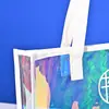 Bolsa de Hombro Láser de PVC al por Mayor en Stock, Bolsa de Compras Láser de TPU Colorida, Bolso de Mano de Moda con Impresión de Logo Disponible