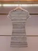 Vestido de punto de manga corta casual de verano nuevo de alta gama para mujer, con bloques de color y rayas, de Shenzhen Nanyou