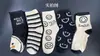 Calcetines de longitud media para mujer Estilo japonés Dibujos animados Lindas Medias Estilo coreano Blanco y negro Sonriente Calcetines de moda Estilo deportivo Calcetines para niña Estudiante