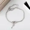 Europa y Estados Unidos superventas todo a juego personalidad hueco incrustado circonita vintage llavero pulsera moda exquisito temperamento pulsera