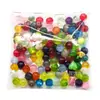 Botones, cuentas y cierres surtidos y coloridos en diseños semitransparentes, disponibles en varios estilos, incluyendo formas redondas e irregulares, para hacer joyería DIY