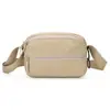 La nueva bolsa de nailon estilo coreano de Shengxilu es ligera, simple, versátil y tiene múltiples compartimentos, ofreciendo una gran capacidad para el uso casual como bolso de hombro.