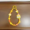Novo Estilo Corrente de Celular com Laço para Boneca, Pingente de Bolsa, Acessório para Capa de Fone de Ouvido, Chaveiro Dopamina Atacado