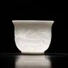 Dehua Artesanal Jade Gordura de Carneiro Relevo Xícara de Chá Kung Fu Xícara de Chá Cerâmica Xícara de Chá Kung Fu Xícara de Aroma Doméstica