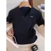 Nuevo estilo primavera y verano, top de punto de seda helada con cuello polo para mujer, camiseta de manga corta fina, holgada, adelgazante y favorecedora para mujer