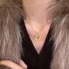 Collar de Calabaza Dorada Brillante Hueca Estilo Chino Retro, Diseño de Nicho, Temperamento de Lujo Ligero, Cadena para Clavícula de Mujer