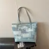 Bolsa Tote Europeia e Americana 2026 Verão Nova Estilosa Grande Capacidade Fashion Simples Design de Personalidade Versátil Ombro Único de Mão