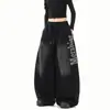 Pantalones deportivos de algodón con lavado negro, degradado, estampado de letras desgastadas, dobladillo curvo para mujer, otoño, estilo urbano retro, holgados, casuales, de pierna ancha