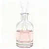 Venta al por mayor de fábrica Botellas vacías personalizadas de vidrio para aromaterapia para uso doméstico Botellas de aromaterapia de 250 ml Adornos de botella vintage Forma cilíndrica