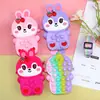Bolsa de silicona transfronteriza de dibujos animados linda monedero de silicona cruzada pequeña para niñas y niños bolsa de almacenamiento de juguete para apretar para aliviar el estrés