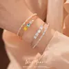 Pulsera abierta de doble capa de oro real de 18k chapado con circonita redonda y cuadrada, simple y elegante, joyería de nicho de lujo ligero