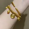 Pulsera Enrollada Dios Dorado de la Riqueza para Mujer Nueva Retro Lujo Accesible Gama Alta Tendencia Nacional Pulsera de Paz y Alegría para Novia