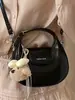 Bolsa de Mão Tendência Estilo Coreano com Formato de Dumpling para Mulheres, Novo Modelo Primavera 2026, Alto Valor Estético, Sensação Única e Relaxada, Bolsa de Ombro Único Transversal