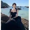 Conjunto de Dos Piezas: Top Tubo Negro + Falda Larga Acampanada de Cintura Alta para Vacaciones en la Playa, Verano, Adelgazante y Elegante