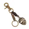 Llavero de piel de vaca vintage para hombre, directo de fábrica punk, con máscara de aleación, colgante decorativo, zona turística, gran oferta