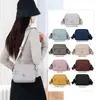 2026 Nova Bolsa Feminina de Cor Sólida Tendência Moda Cor Sólida Ombro Único Transversal Simples Bolsa Feminina de Nylon Casual Pequena Quadrada