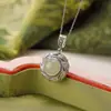 Prata Yilu Jade Hetian Prata Esterlina S925 Jade Água Clara Âmbar Lótus Vajra Pilão Pingente Rotativo Redondo Personalizado Atacado