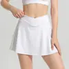 Conjunto deportivo de yoga dos en uno integrado con sujetador deportivo de alta intensidad, falda de yoga a prueba de impactos y anti-caída, y pantalones para mujer