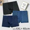 Calzoncillos de Seda de Leche de Cintura Alta Cómodos Elásticos Pantalones Estampados Baotou Venta al por Mayor de Ropa Interior para Hombre