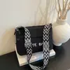 Nova moda primavera, bolsa de ombro casual feminina, bolsa transversal, bolsa de trabalho moderna e estilosa 2026, bolsa quadrada pequena para exportação