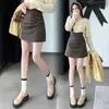 Outono e Inverno Novo Design Sensação Saia Plissada Pequena de Couro Meia Saia Feminina Justa ao Corpo Cintura Alta Plissada Linha A Curta