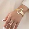 Conjunto de pulseira aberta e anel geométricos de design metálico transfronteiriço europeu e americano para mulheres, joias estilo punk retrô exagerado