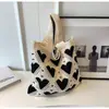 Nuevos bolsos de moda de celebridades de Internet para mujer, bolso de cubo de lana tejida, bolso de mano casual, bolsa para el almuerzo, venta al por mayor