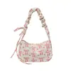 Bolsa de axila estampada de alta qualidade para mulheres, um novo estilo transfronteiriço com um design de laço fresco e delicado, uma bolsa de ombro chique e estilosa, e uma bolsa de mão única.